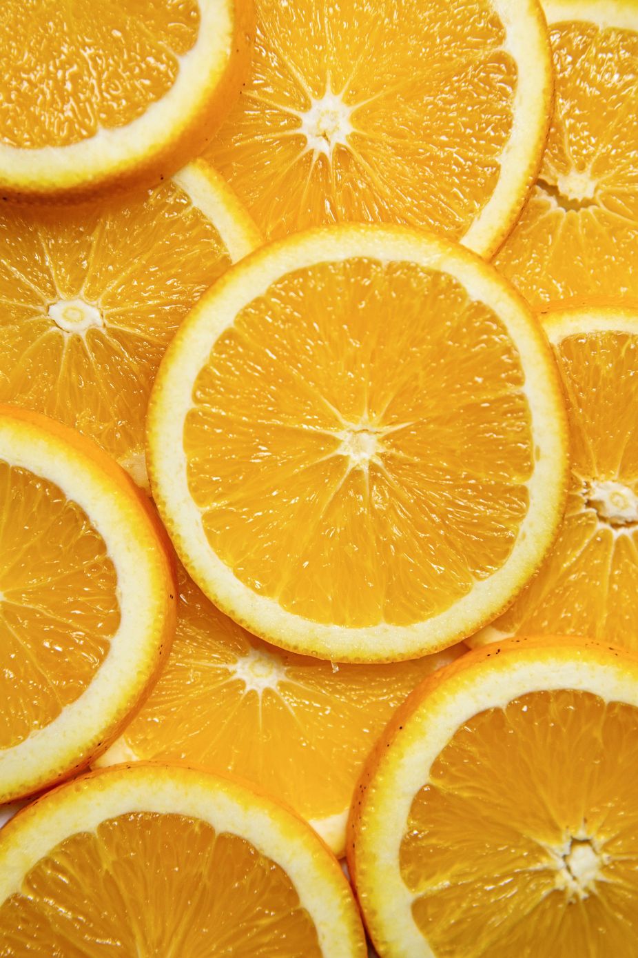 An orange cut into thin pieces.